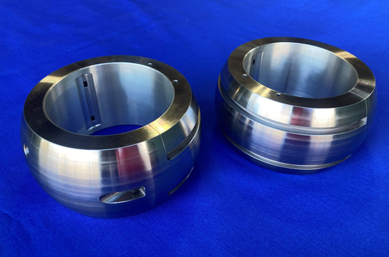 Split spherical Babbitt bearing with pressure dam and RTD slots